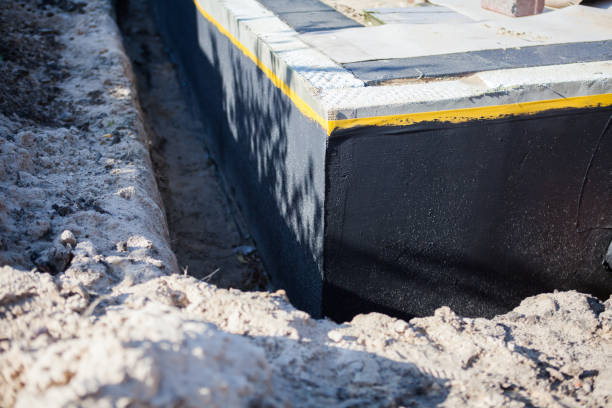 Professional Waterproofing technician working in Islip, NY